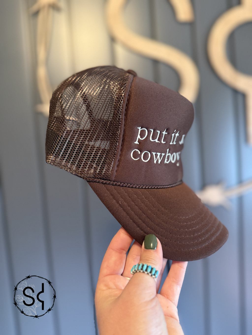 Put it on the Cowboy's Tab Trucker Hat