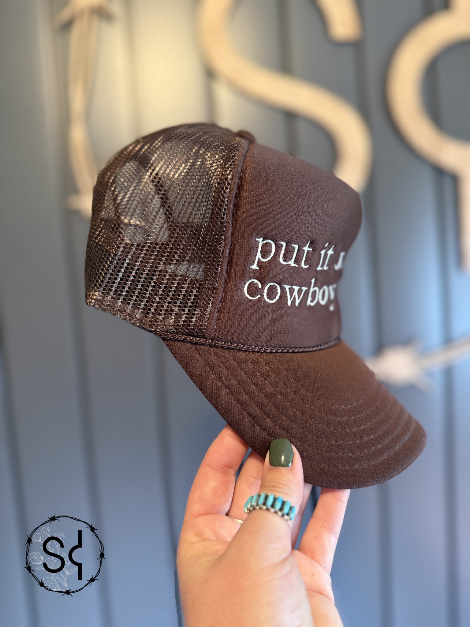 Put it on the Cowboy's Tab Trucker Hat